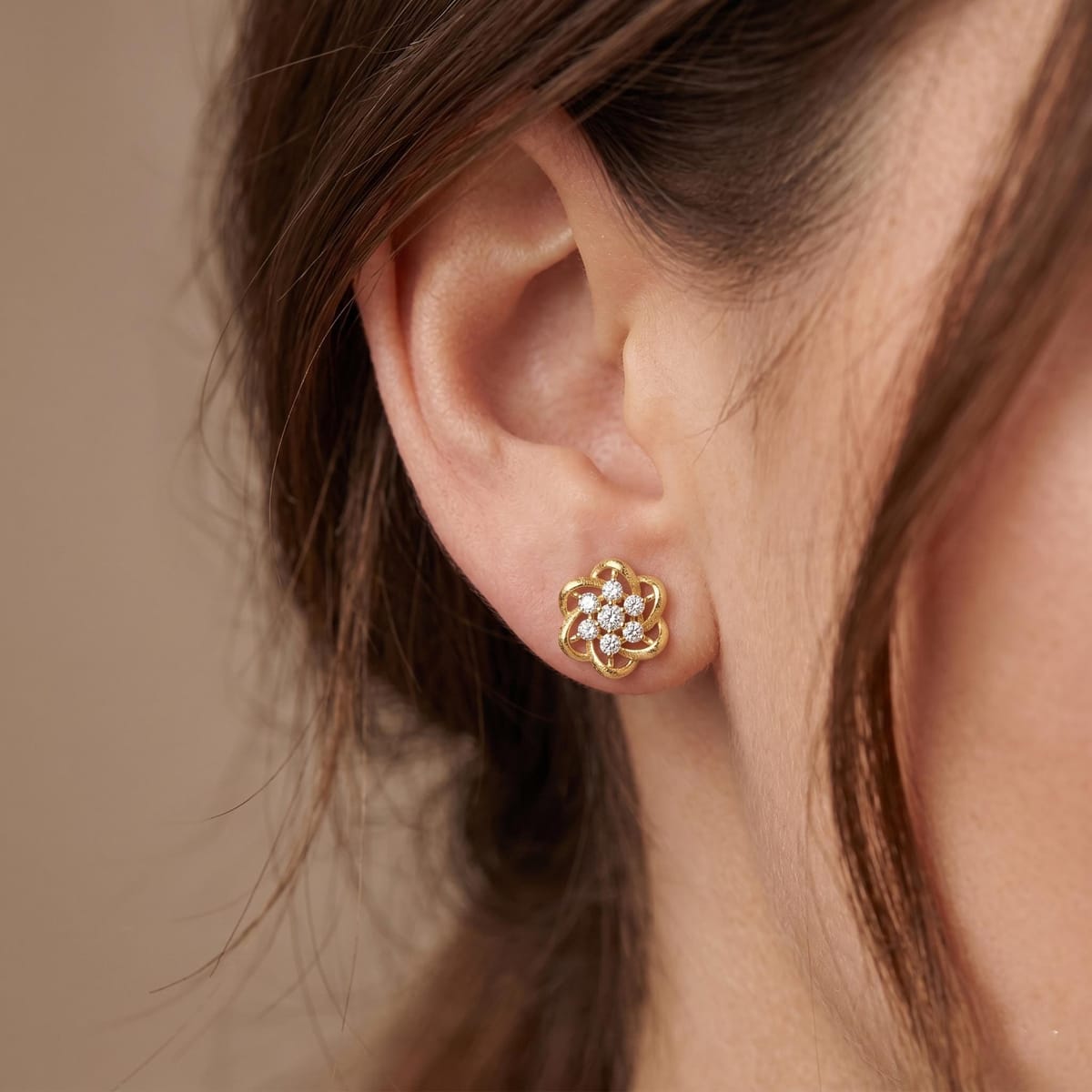 Gold floral stud earrings