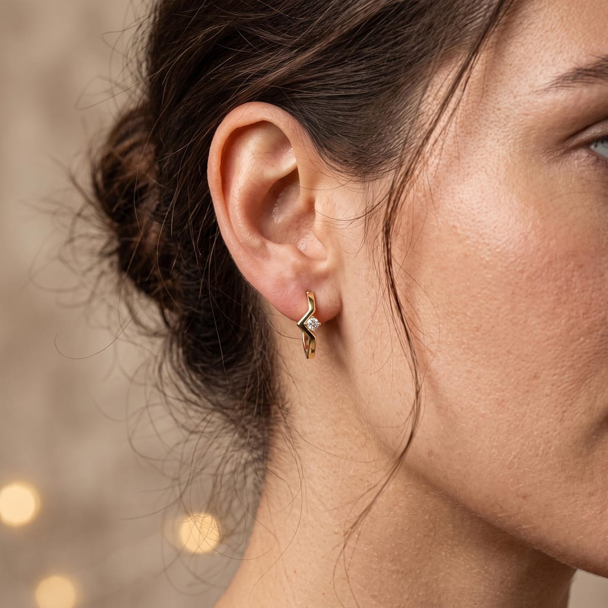 Chevron diamond huggie earrings
