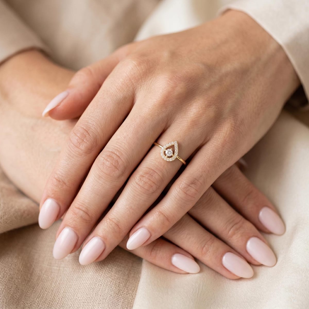 Teardrop floating diamond ring