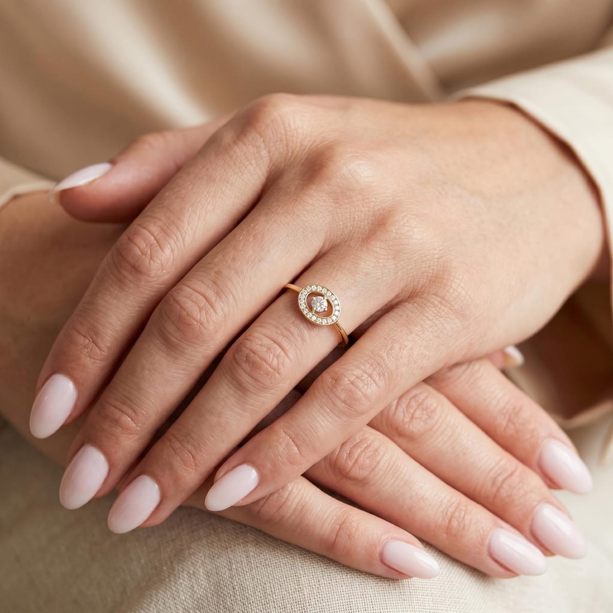 Floating solitaire oval halo ring