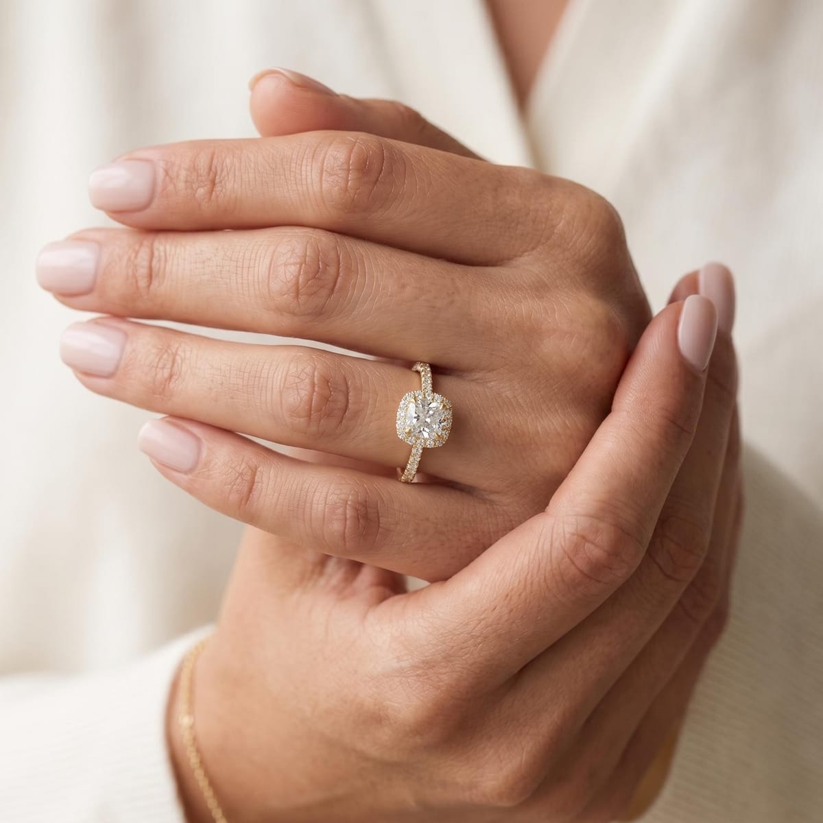 Cushion-cut halo engagement ring