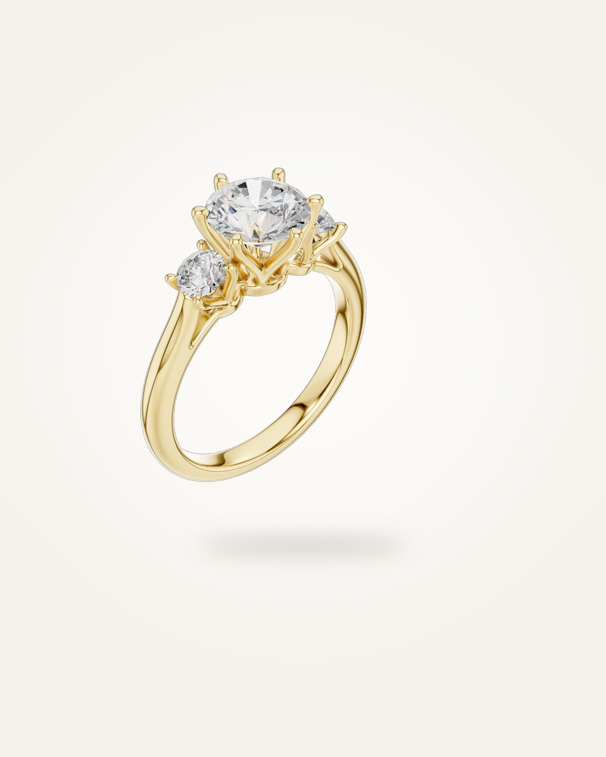 Round-cut three-stone engagement ring, 1.9 ct