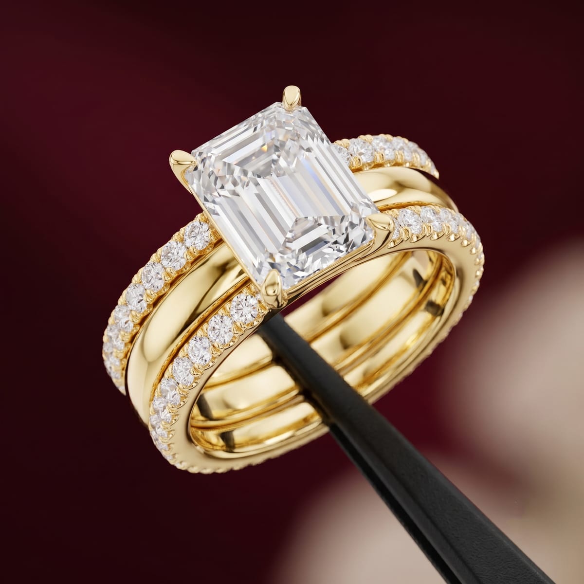 Emerald-cut diamond ring, triple-row band